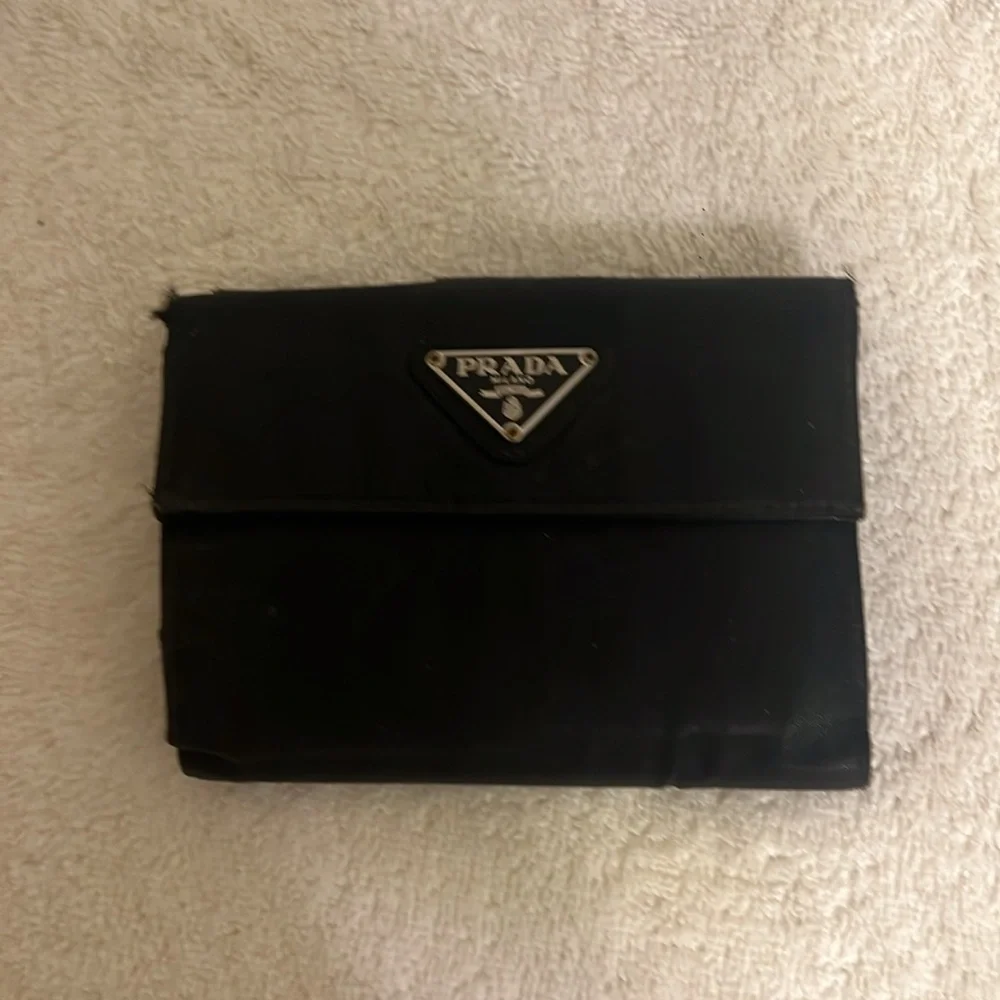 Prada triangle logo shoulder baghandbag, nylon & saffiano leather, black walllet